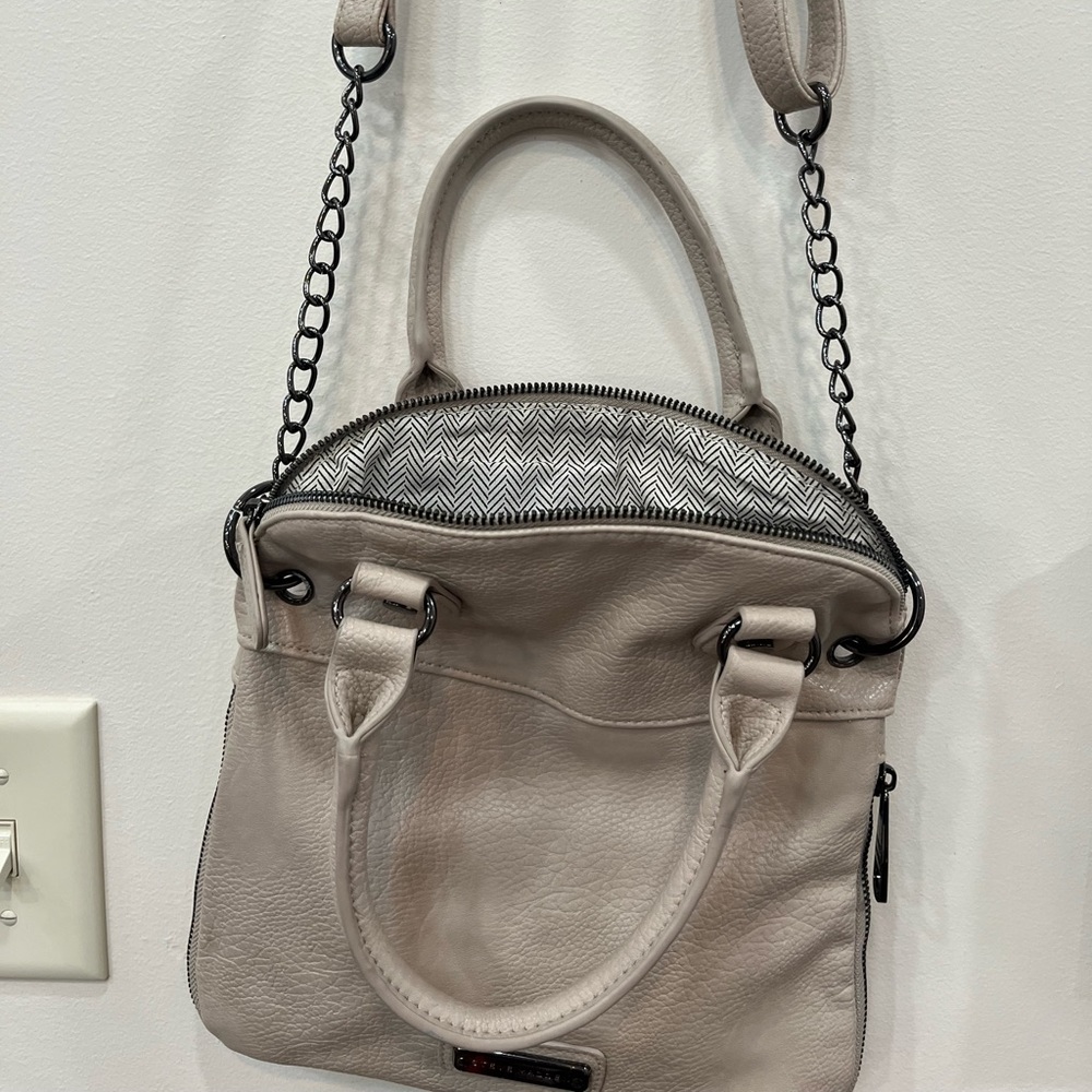Steve Madden expandable purse.